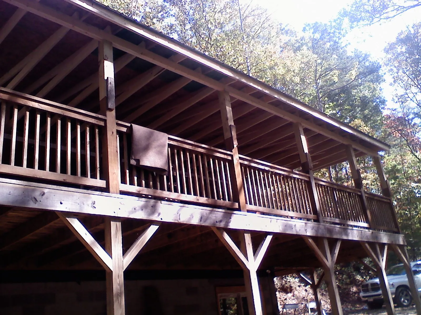 Timber framing under a new elevated porch and deck — Roof Leak Repair in Jamesport by Roofing Brothers